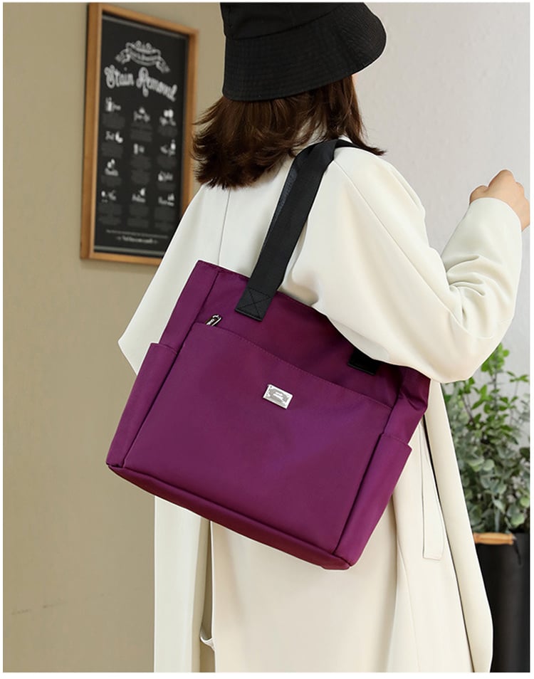 🔥Wodoodporna nylonowa torba na ramię o dużej pojemności i wielu kieszeniach👜
