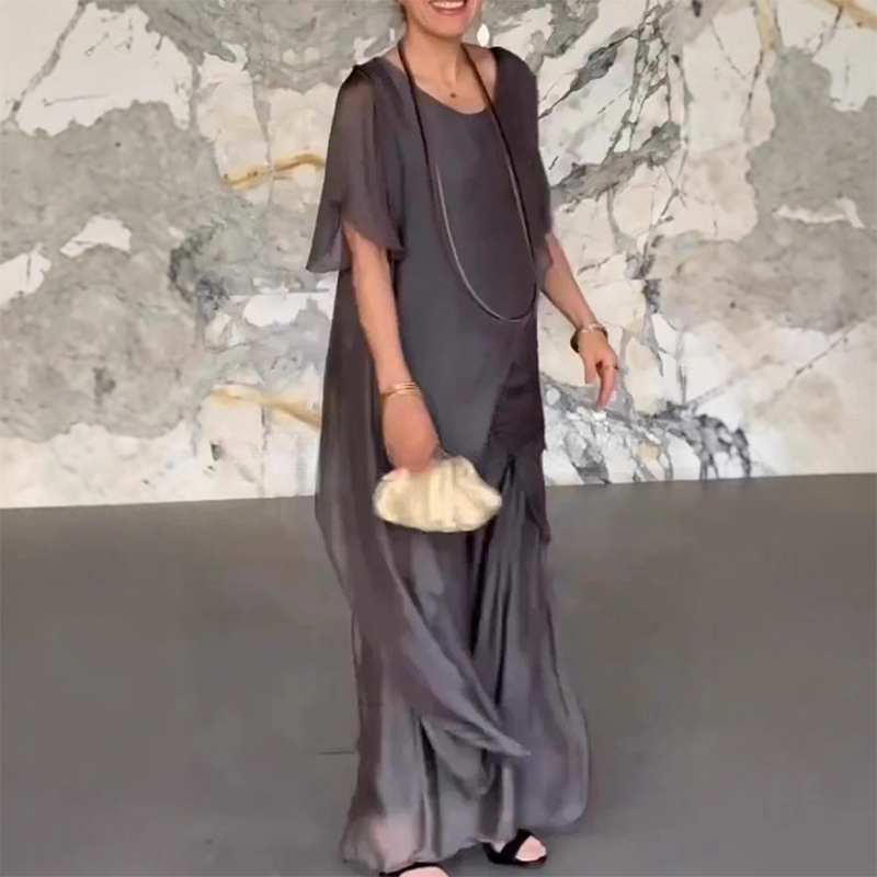 🛍️✨ Dámsky set pozostávajúci z nepravidelnej blúzky a ľahkých nohavíc-SK