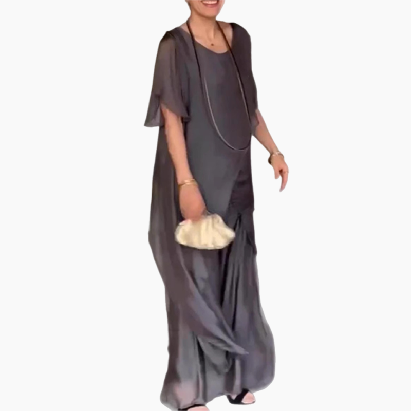 🛍️✨ Dámsky set pozostávajúci z nepravidelnej blúzky a ľahkých nohavíc-SK