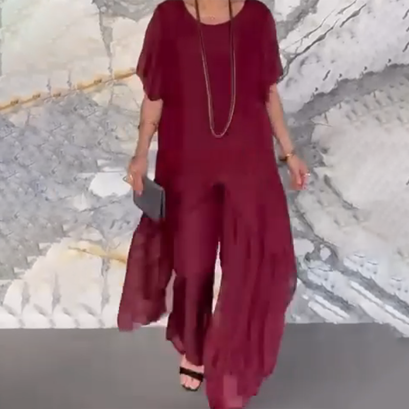 🛍️✨ Dámsky set pozostávajúci z nepravidelnej blúzky a ľahkých nohavíc-SK