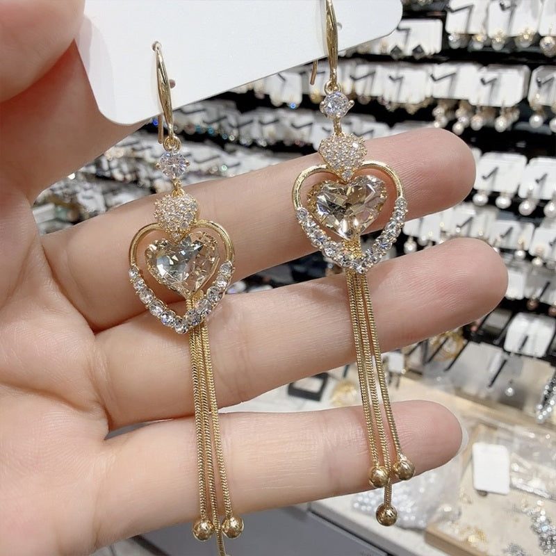 ✨ Eleganckie kolczyki z frędzlami w kształcie serca